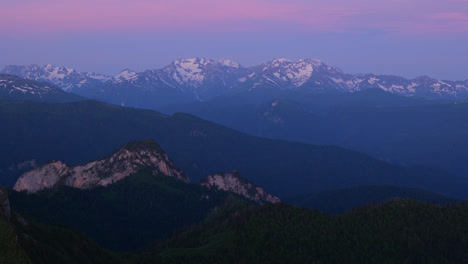 blue hour purple hue dusk sunset on caucasus kavkaz mountain range snowy ridgeline