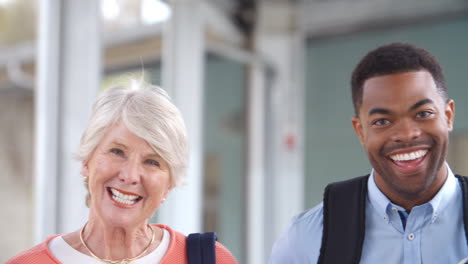 panning shot of laughing teachers after school