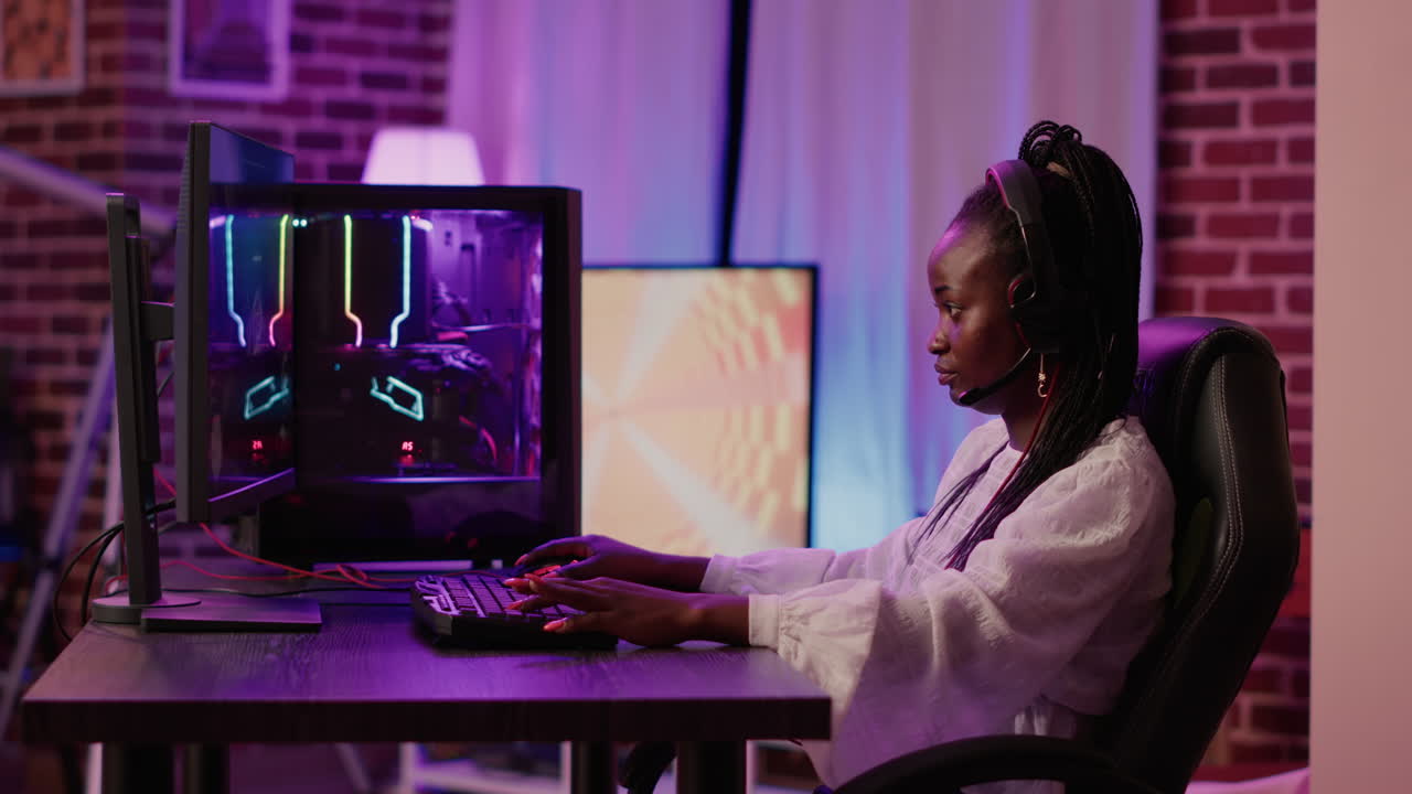 African american gamer girl streaming online first person shooter action game surprised after winning online competition