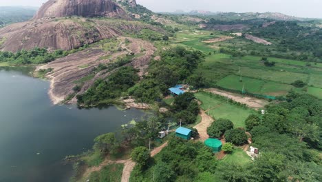 aerial circling over cultivated lands near the river