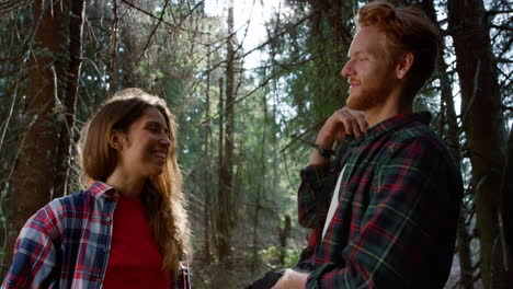 Young-couple-hugging-in-the-forest