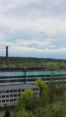aero view of ruined city full of disaster. abandoned houses in ruined city. vertical video