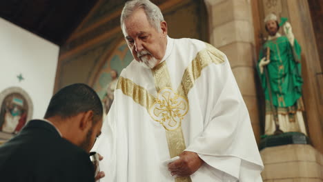 priest man, communion drink