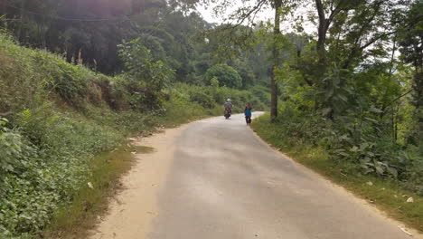 driving motorcycles on the roads in the country of nepal