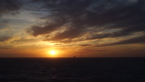 ship cruising on sunset in the mediterranean sea