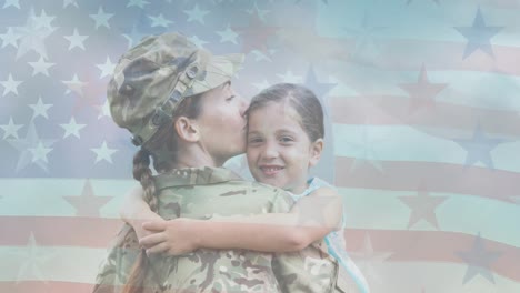 animación de una soldado abrazando a su hija sonriente moviéndose sobre la bandera estadounidense