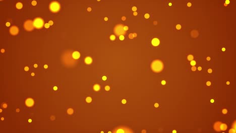 círculos amarillos partículas brillantes animación de bucle sin costuras en fondo dorado.