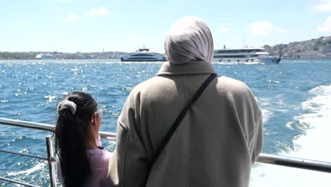 mother and daughter on a ferry ride