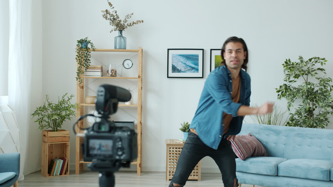 Man Vlogging in His Living Room