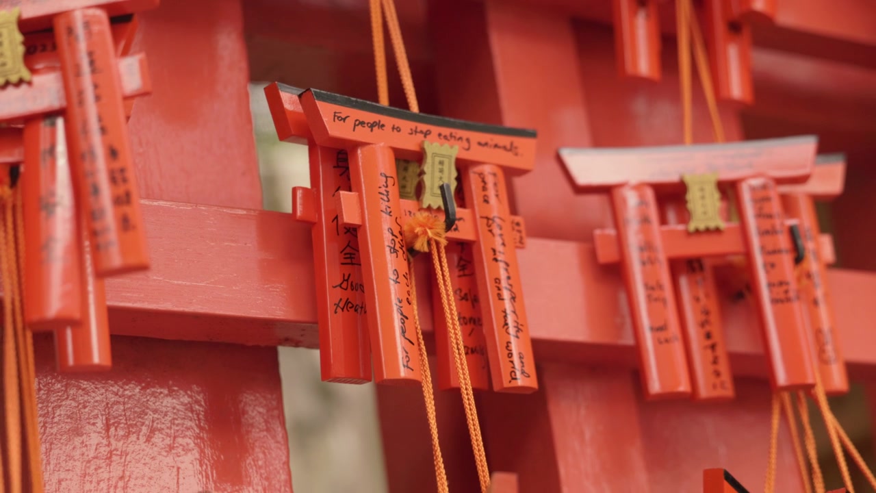Traditional Ema Wooden Wishing Plaques Hanging On A Rack At A Shinto Shrine In Japan - Close Up