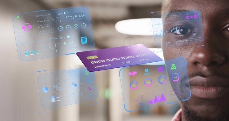 Man focusing gaze initiating card hologram rotating updating finance panels in office for review