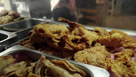 original mexican taquero street restaruatn preparing tacos carnitas meat michoacan style chicharrron castakan