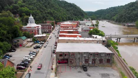 4k aerial drone video of historic madison county courthouse on the french broad river in downtown marshall, nc (2021)