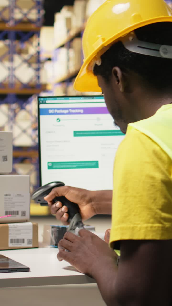 Vertical Video Storage room employee scanning shipping labels to register in inventory