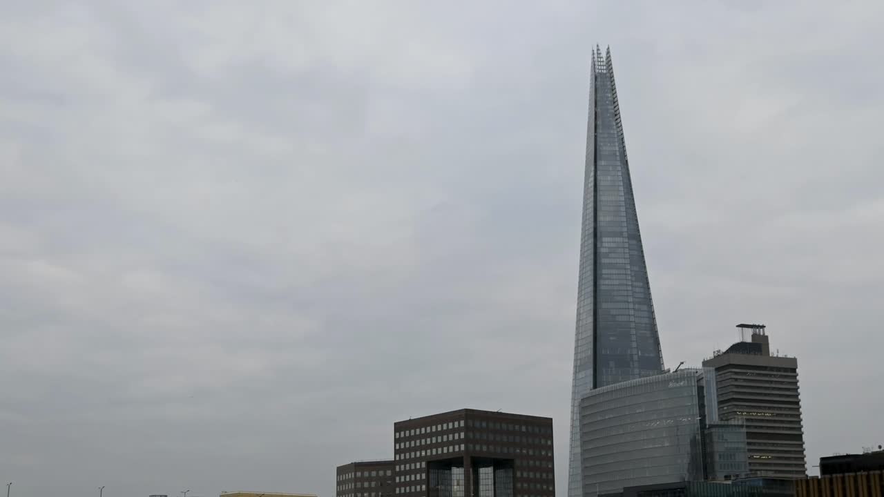 Planes flying past The Shard, London, United Kingdom