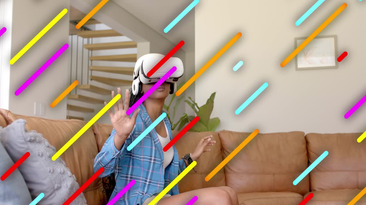 Woman sitting couch using VR set raising hand selecting navigating UI with pad and bright diagonals