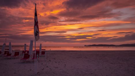 breathtaking timelapse by the beach during golden hour in the sunset in alghero, sardinia, italy