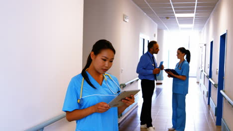 nurse holding digital tablet in hospital