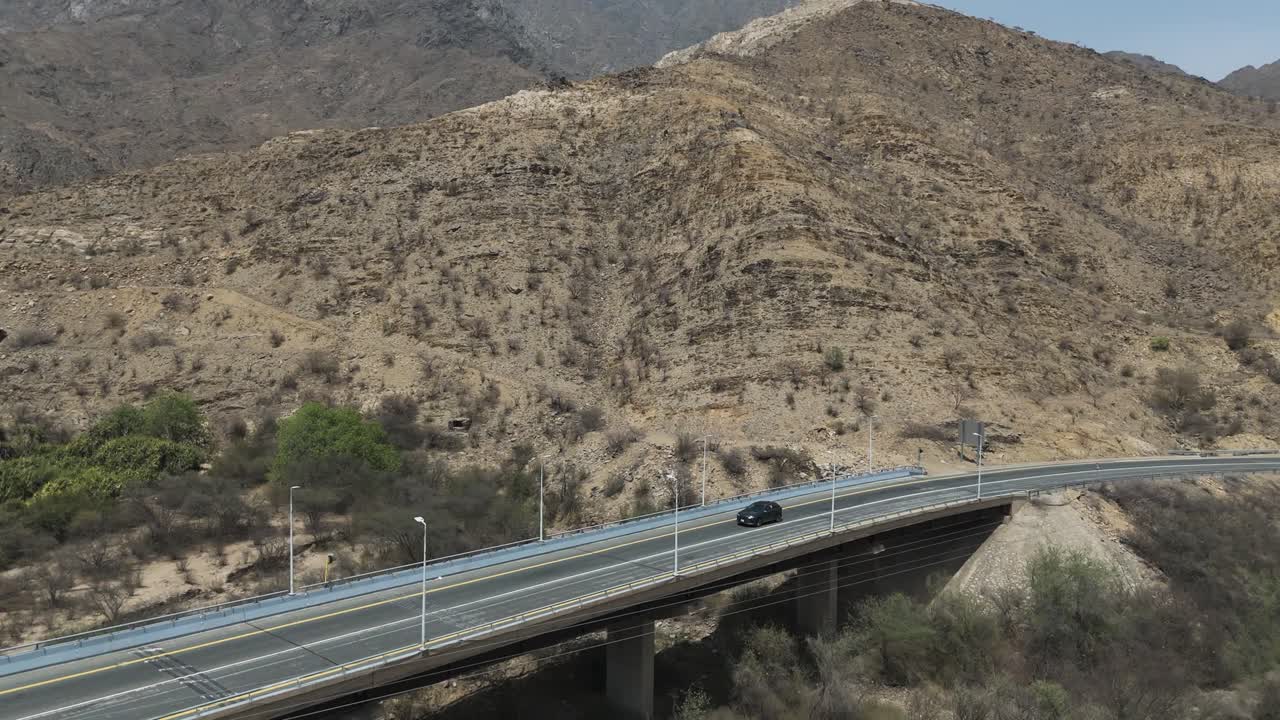 Bridge over arid landscape