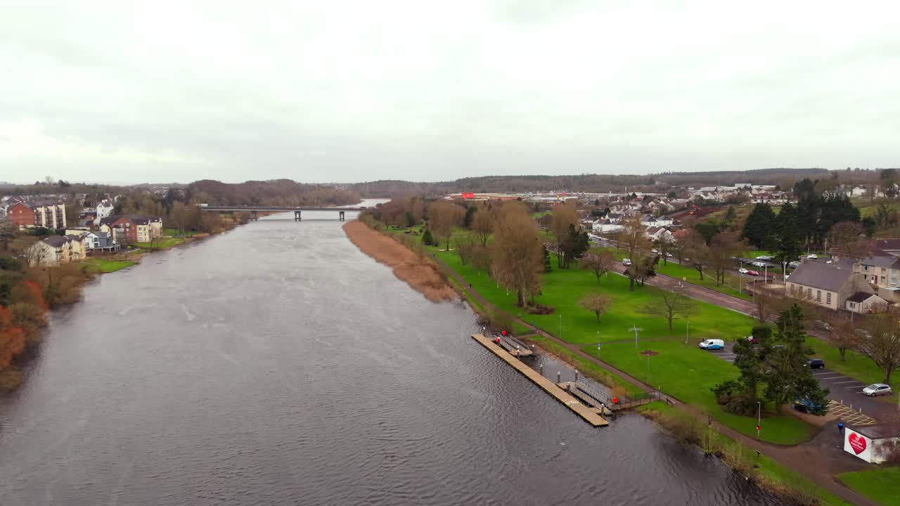 Wide advancing aerial video of the River Bann in Coleraine, Northern Ireland in the UK. The video is produced in 4K, 60FPS and with Rec709 color