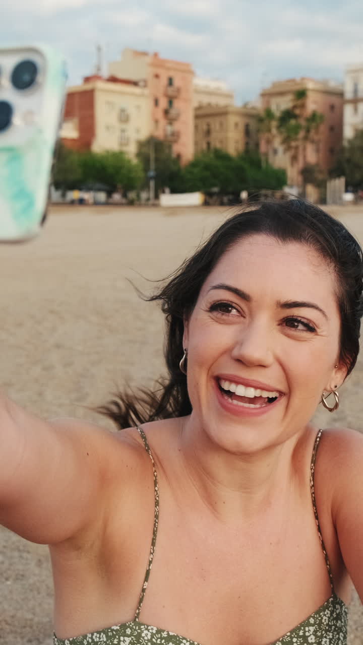 Woman taking a selfie at the beach