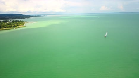 sail boats on the blue lake in summer balaton hungary