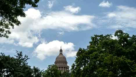 time lapse of clouds passing over the austin texas capitol