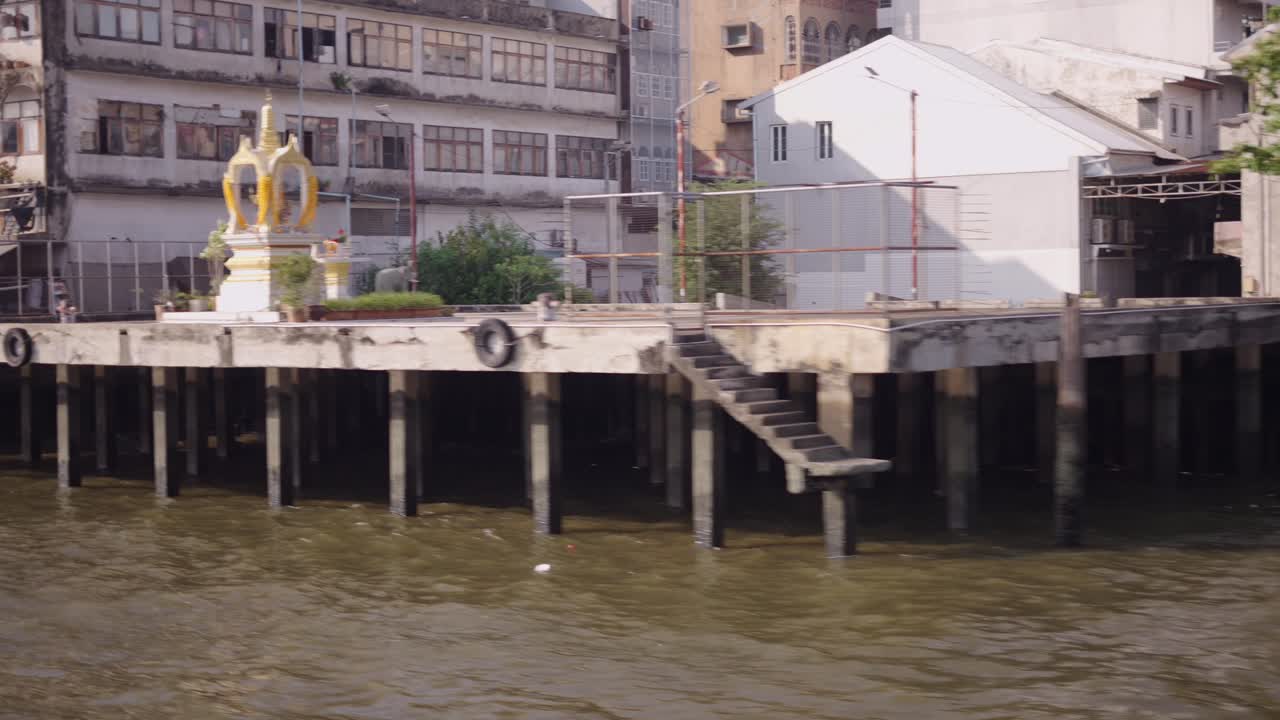 Riverside buildings and houses in Thailand