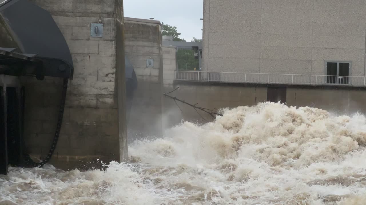 Water drane through barrage bergheim near ingolstadt river donau at peak level during flood