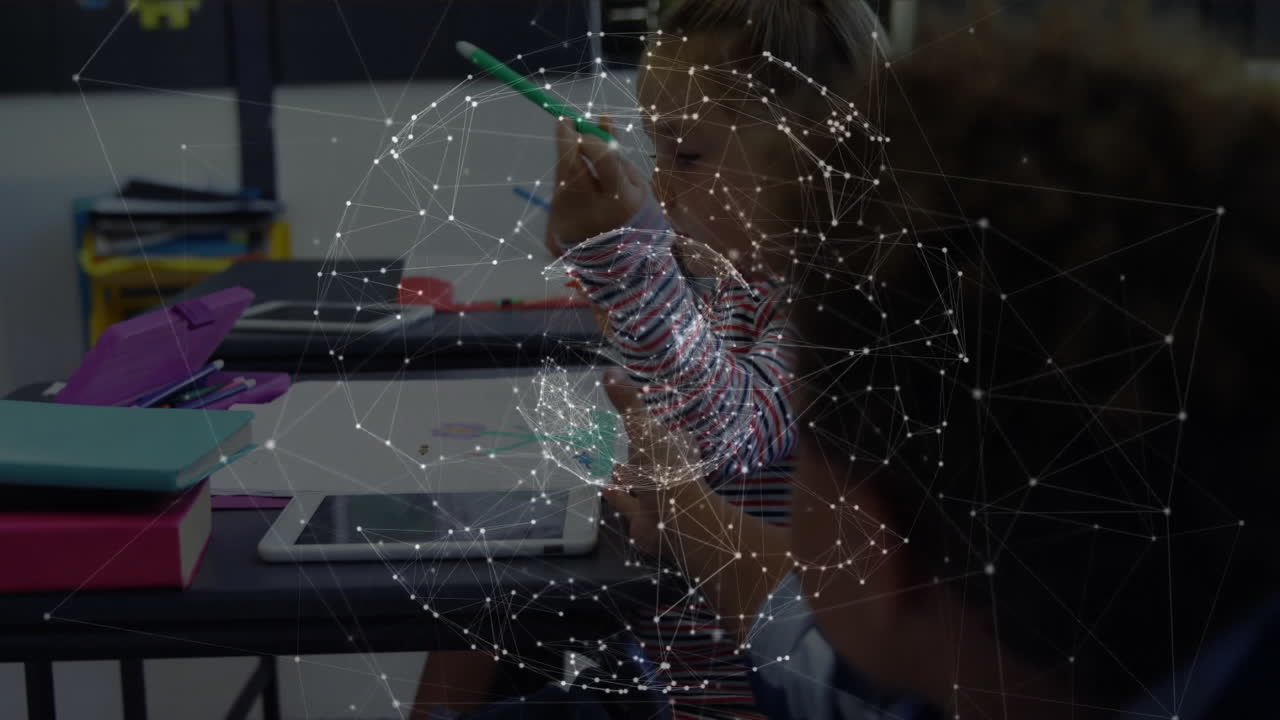 In school, children interacting with digital network animation in classroom setting