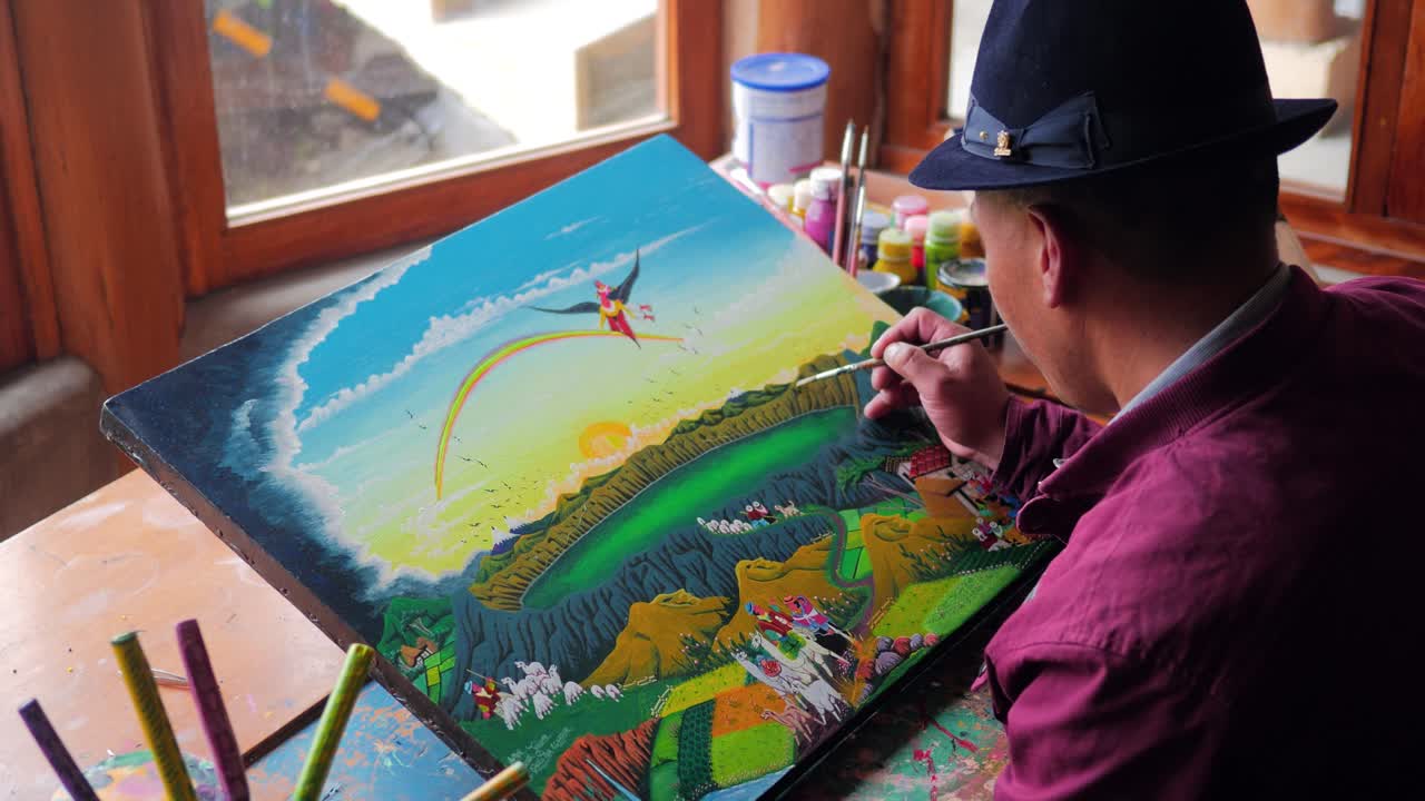 화가 한 명 은 자기 집 창문 앞 에 있는 캔버스 에 아름다운 동화 를 그린다