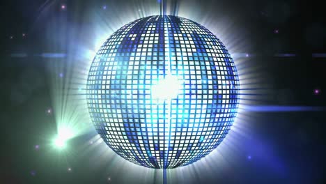 Animation-of-glowing-and-sparkling-mirror-disco-ball-spinning,-green-spotlight-moving-around