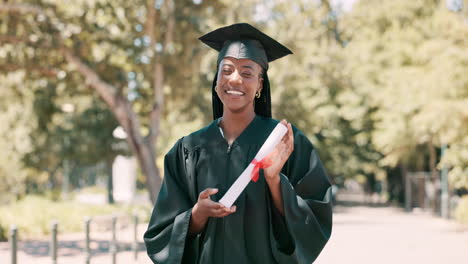 happy graduate holding diploma