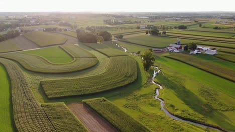 creek, stream snakes through rural pennsylvania farmland