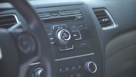 pressing the power button to turn on the cd player on a car radio