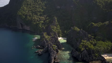 Beautiful-Lagoon-With-Turquoise-Water-And-Cliffs---aerial-drone-shot