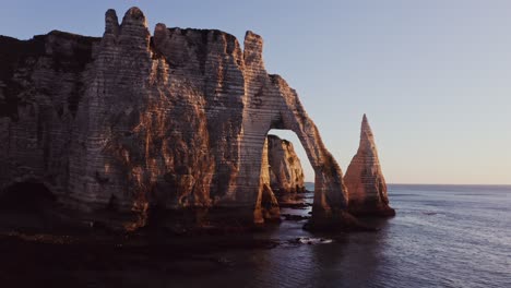 dramatic white cliffs of france at sunset