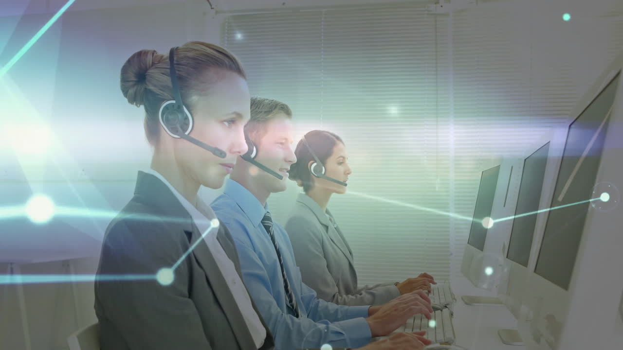 In office, customer service team working at computers with animation overlay