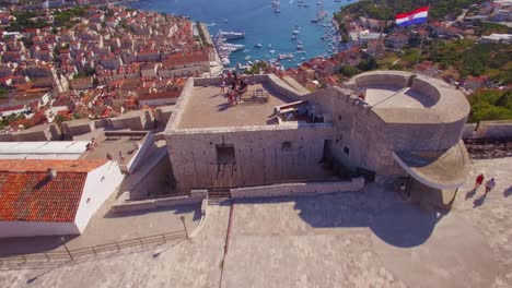 Beautiful-aerial-establishing-shot-over-Hvar-Croatia-and-it's-distinctive-minarets