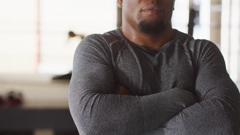 video of fit african american man posing at gym