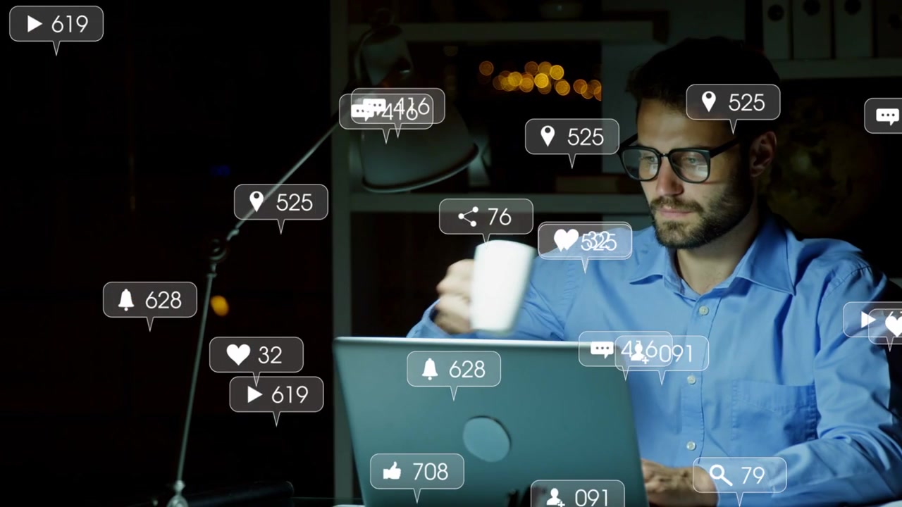 Man sitting at desk typing, monitoring marketing metrics, icons appearing while sipping mug, fading