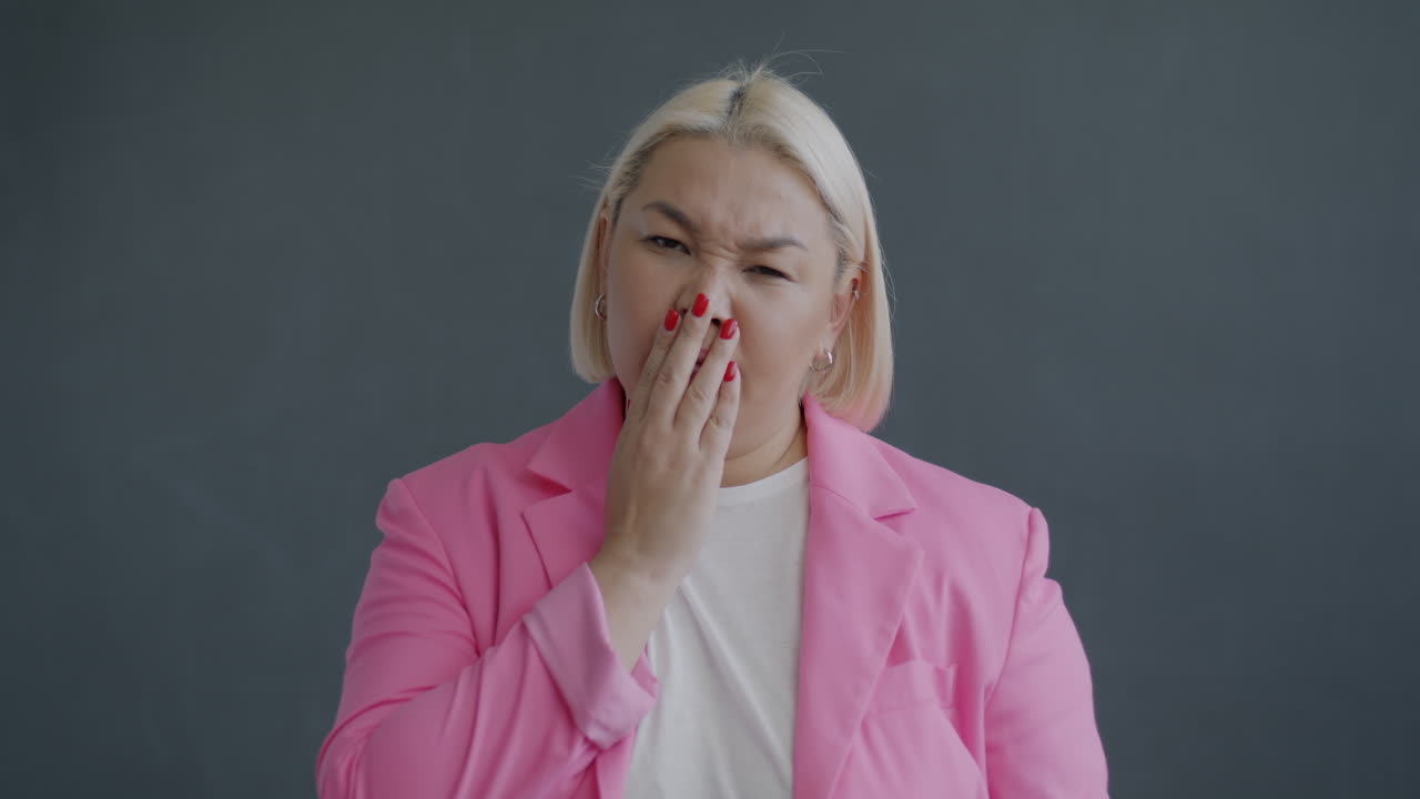 Woman looking bored and annoyed.