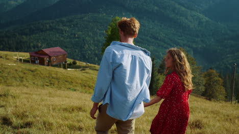 married couple spend holiday in mountains nature. family going hike outdoors.