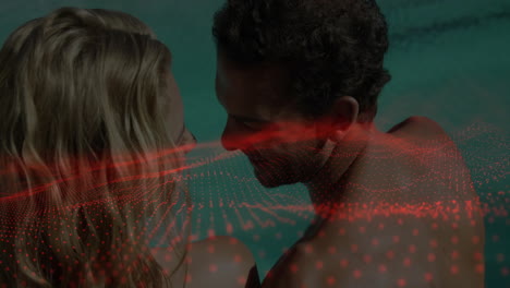 embracing couple with red digital wave animation overlay in romantic setting