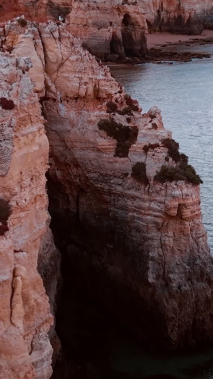 Exploring the cliffs and ocean at Lagos in Portugal during sunset