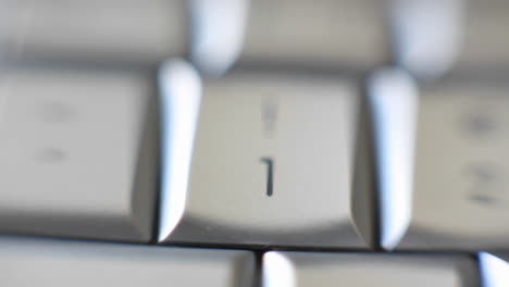 the number 1 key on a keyboard comes into focus