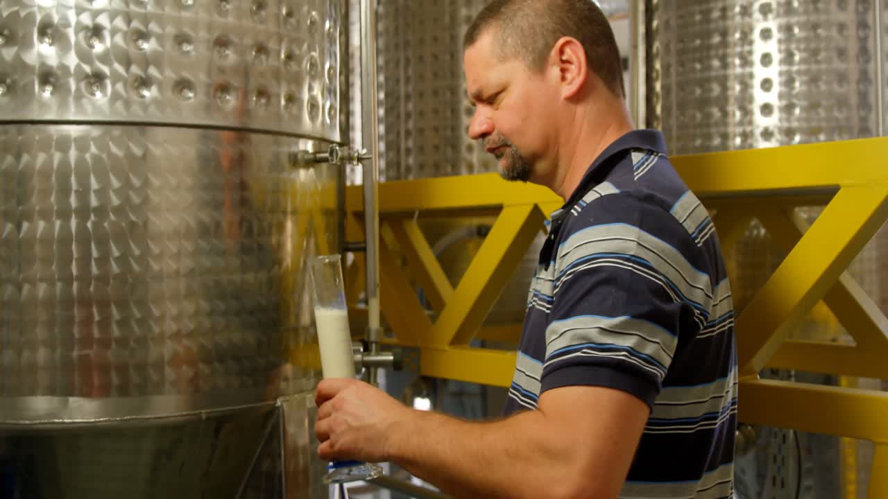 Male worker working in factory 4k