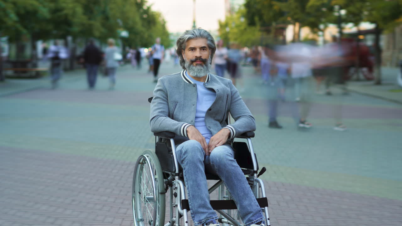 Older Man in Wheelchair on City Street