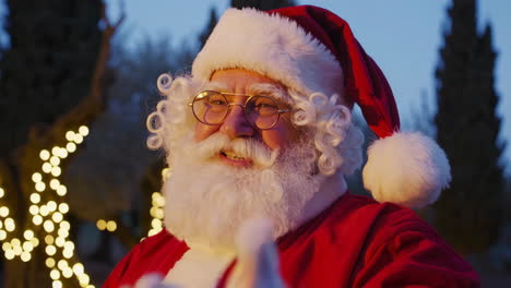 santa claus in an olive grove at night