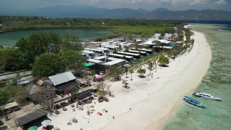 Aerial-of-Gili-Meno,-nestled-among-the-idyllic-Gili-Islands-of-Indonesia,-stands-as-a-serene-and-enchanting-paradise-for-travelers-seeking-an-escape-from-the-ordinary